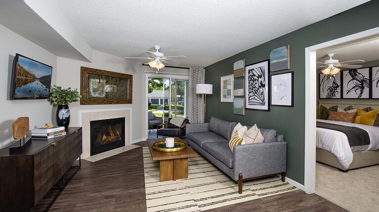 Spacious Living Room with Fireplace and Ceiling Fan