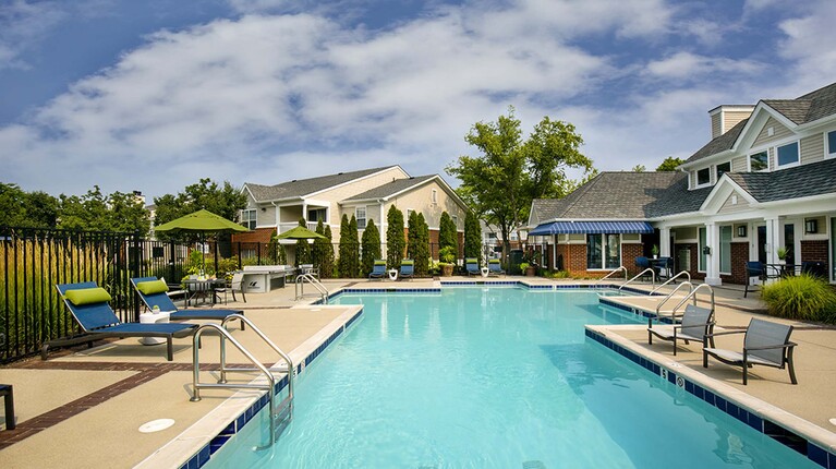 Resort-Inspired Pool with Sundeck and Lounge Seating